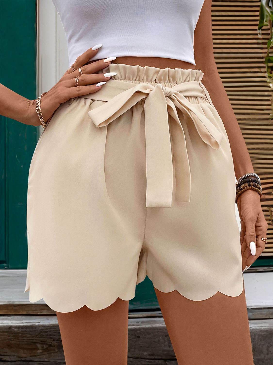 Pantalones cortos con volantes y bolsillos
