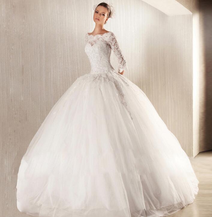 Vestido de novia estilo princesa con mangas largas y encaje francés de ángel