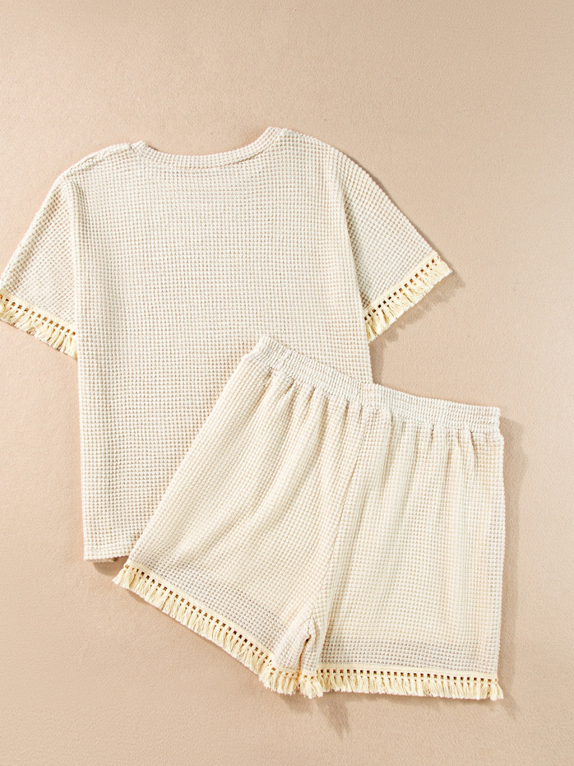 Conjunto de top y pantalones cortos con cuello redondo y borlas