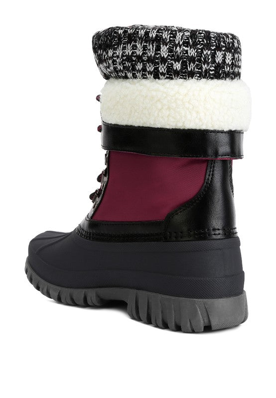 Botas de punto con cuello y cordones Delphine