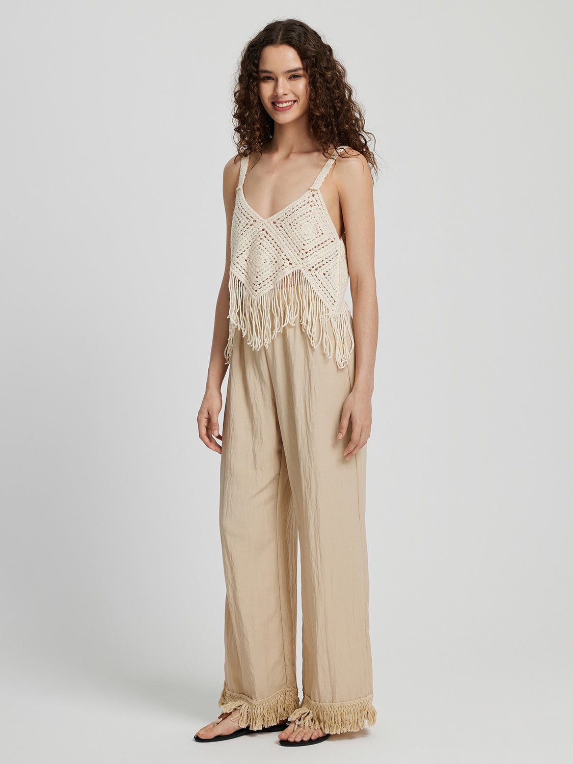 Pantalones largos de pierna ancha con dobladillo con flecos