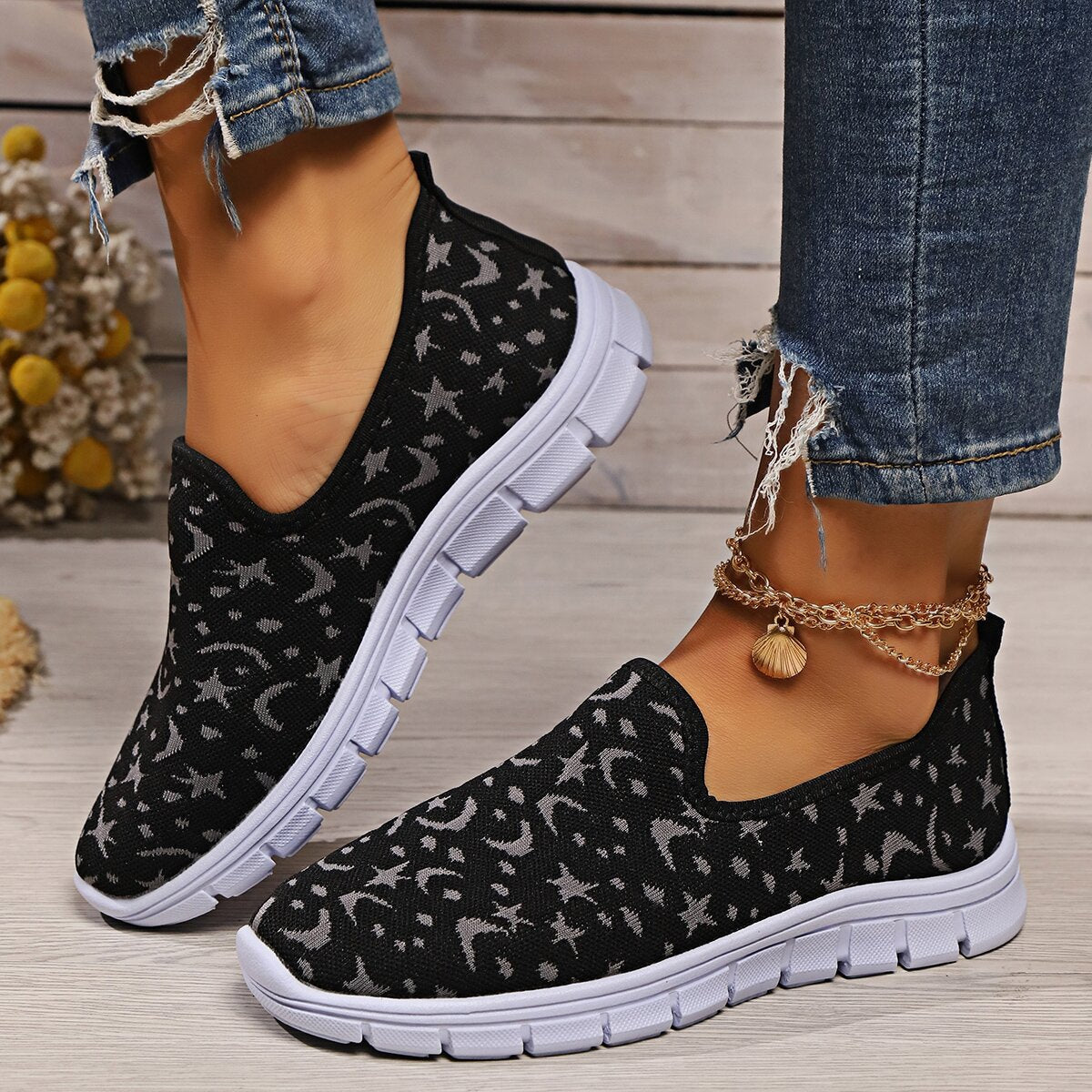 Mocasines planos con estampado de estrellas y lunas