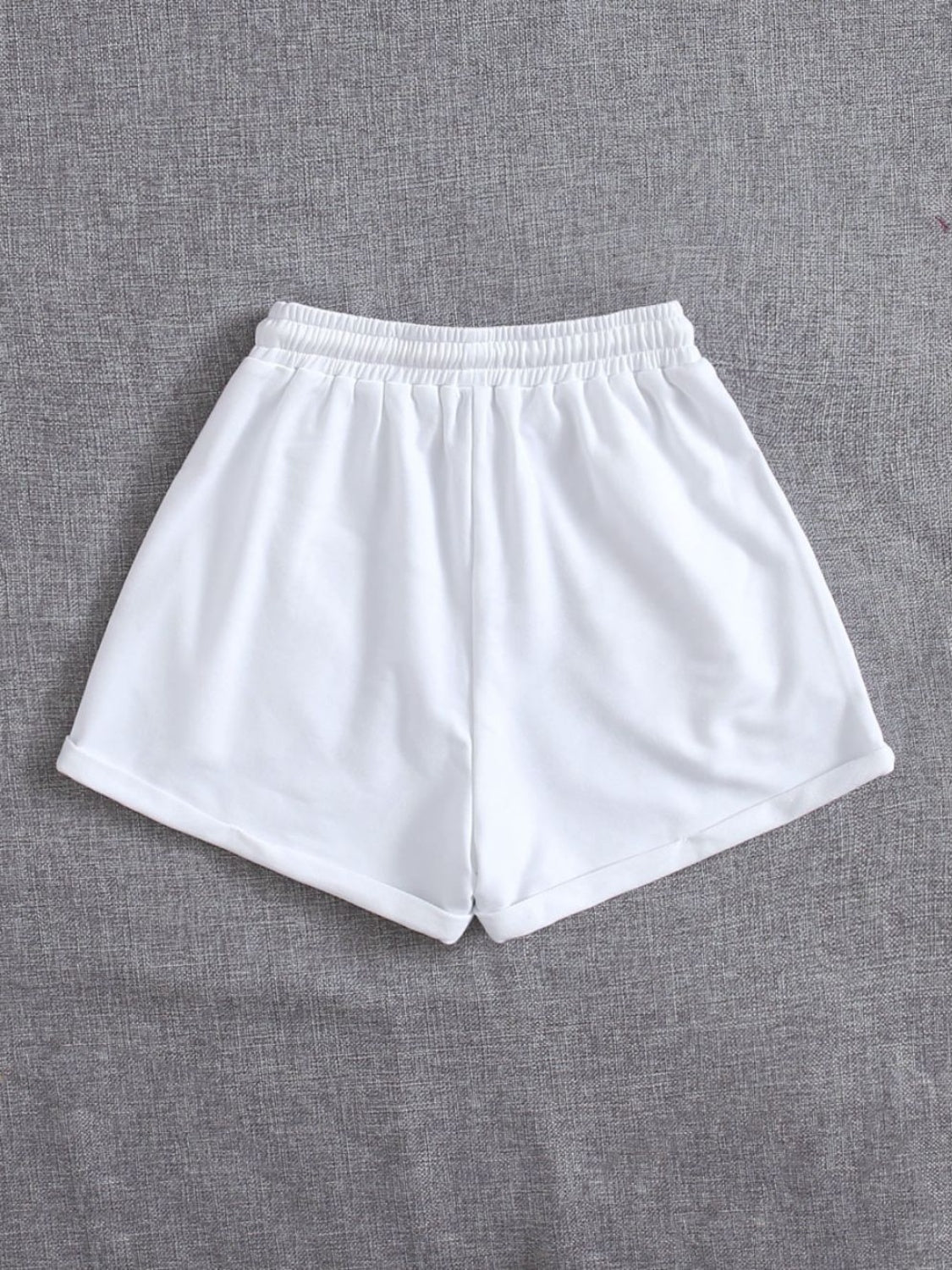 Pantalones cortos con cintura elástica y bolsillos con cordón