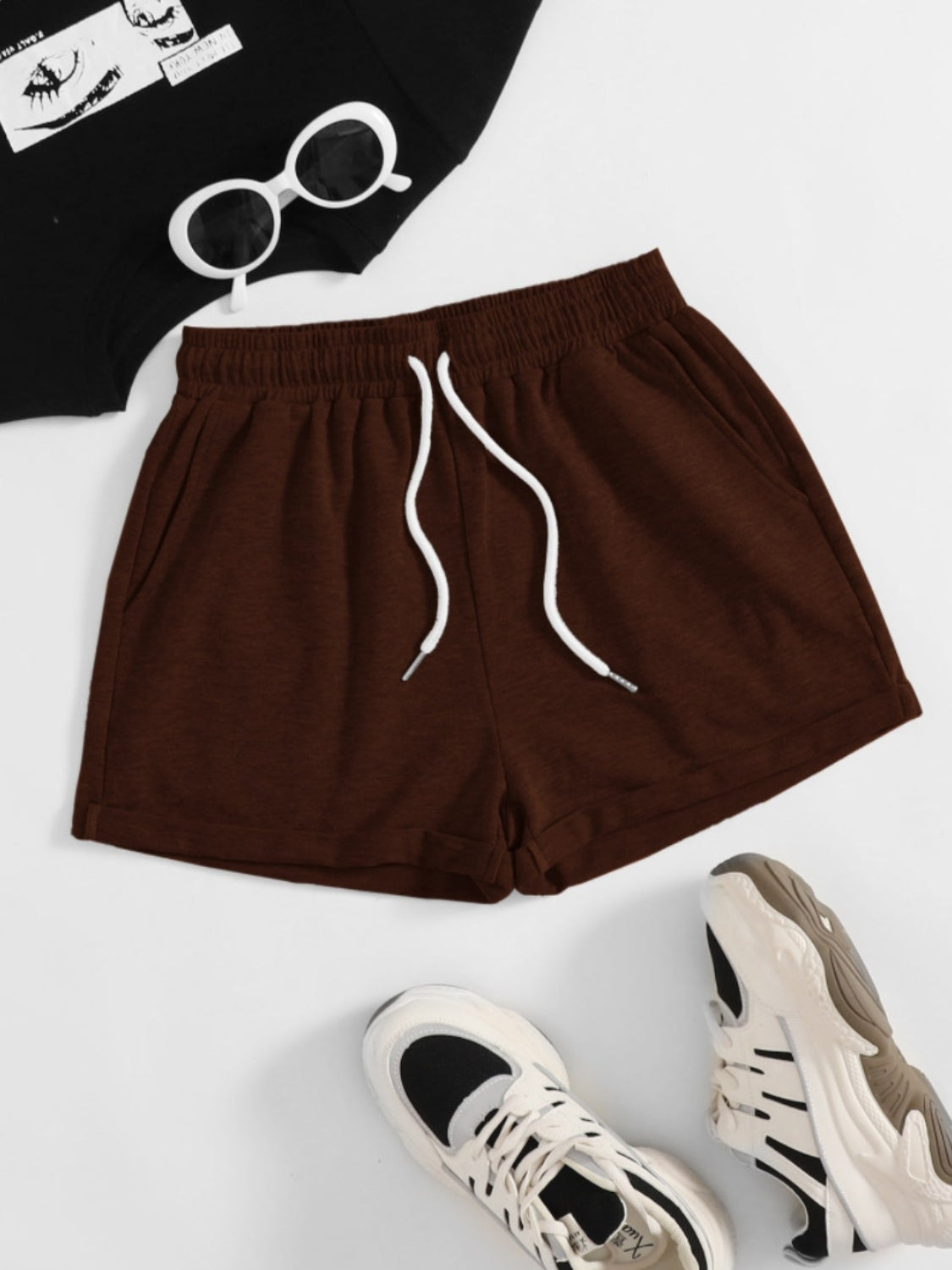 Pantalones cortos con cintura elástica y bolsillos con cordón