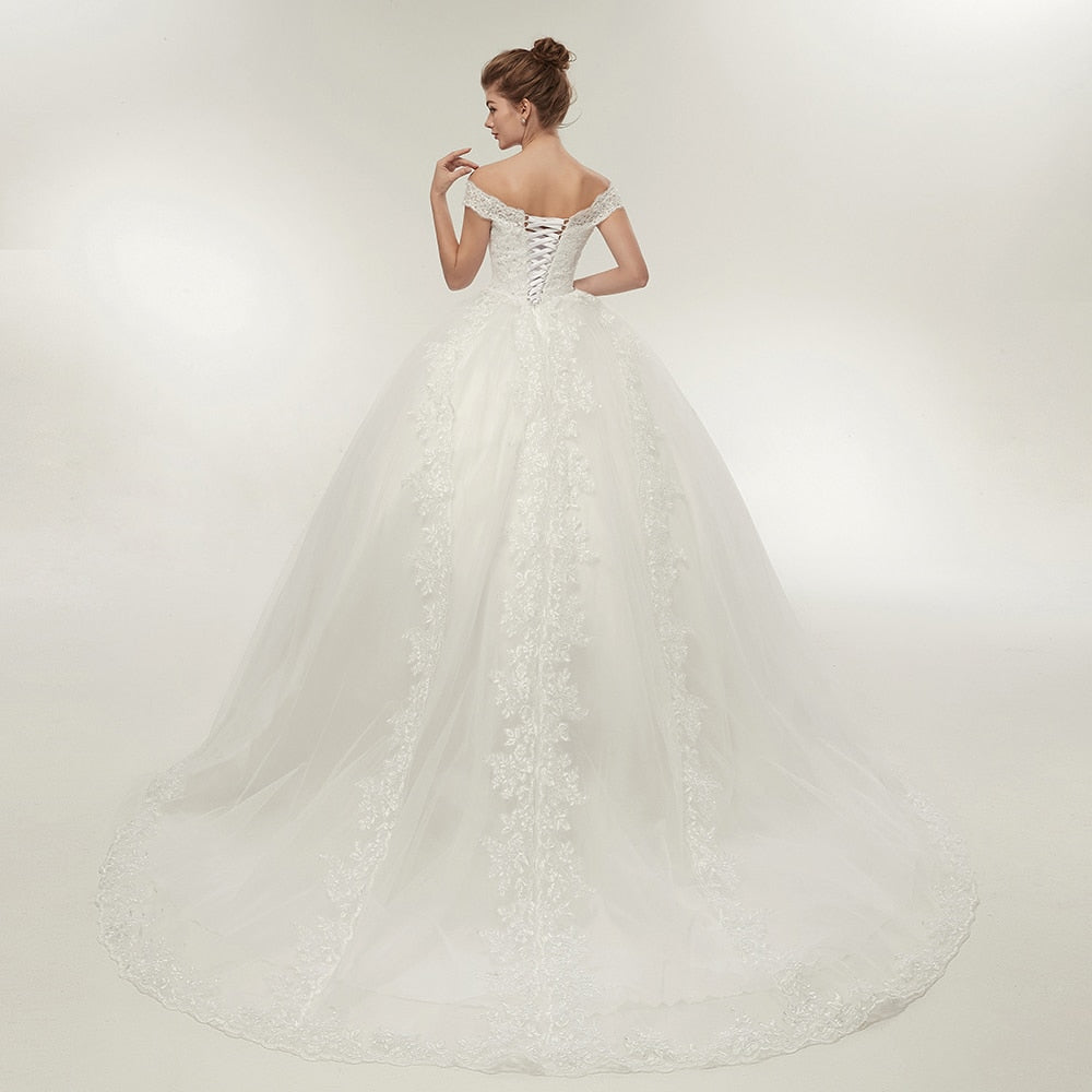 Vestido de novia vintage blanco con cola larga