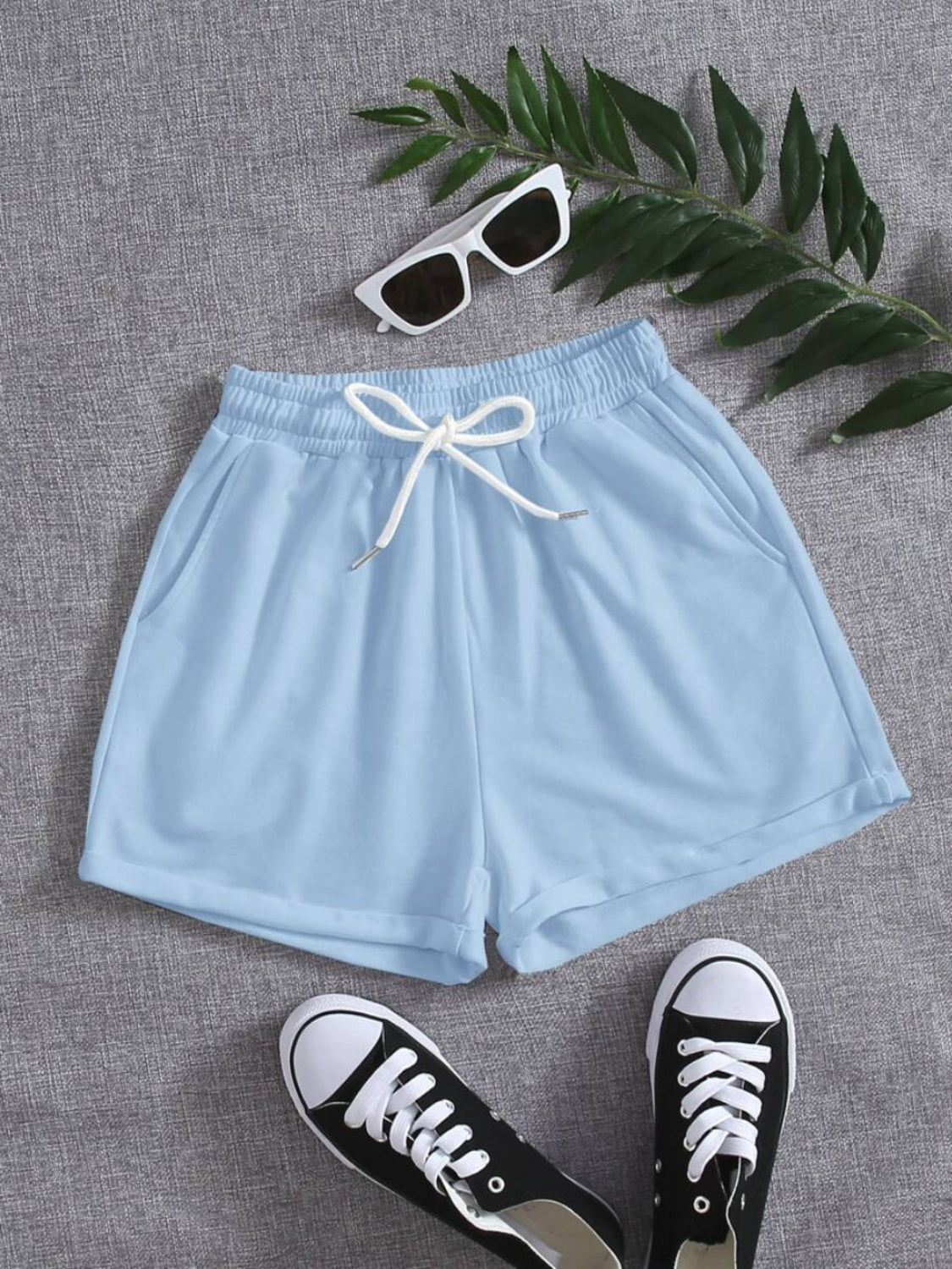Pantalones cortos con cintura elástica y bolsillos con cordón
