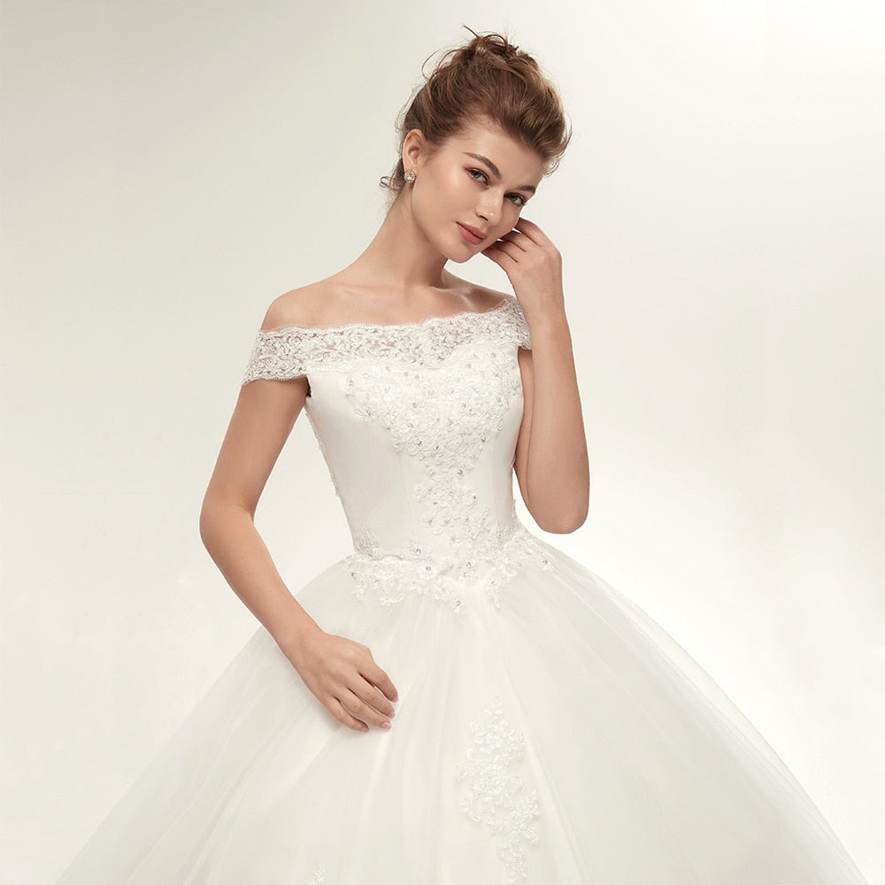 Vestido de novia vintage blanco con cola larga