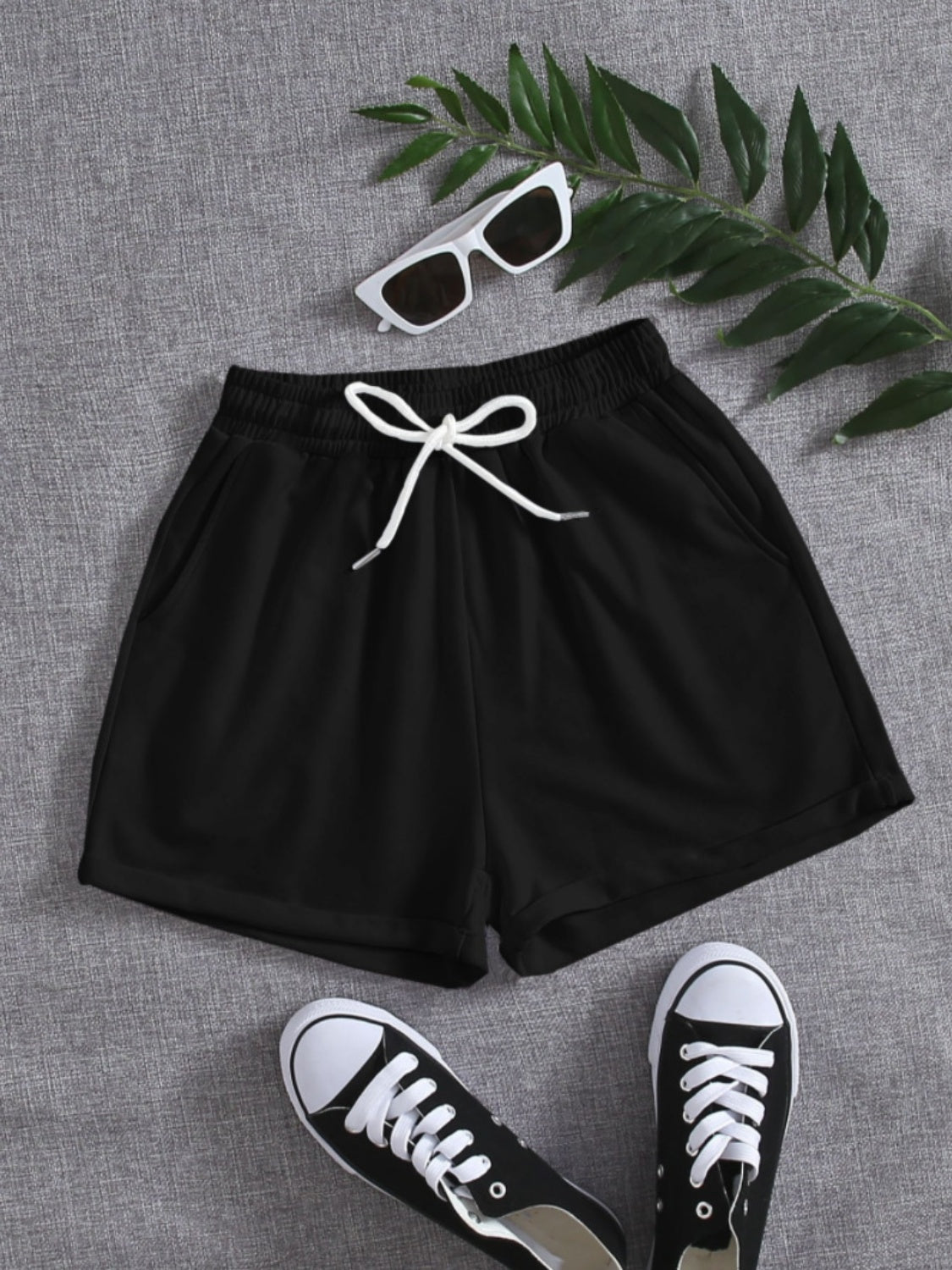 Pantalones cortos con cintura elástica y bolsillos con cordón