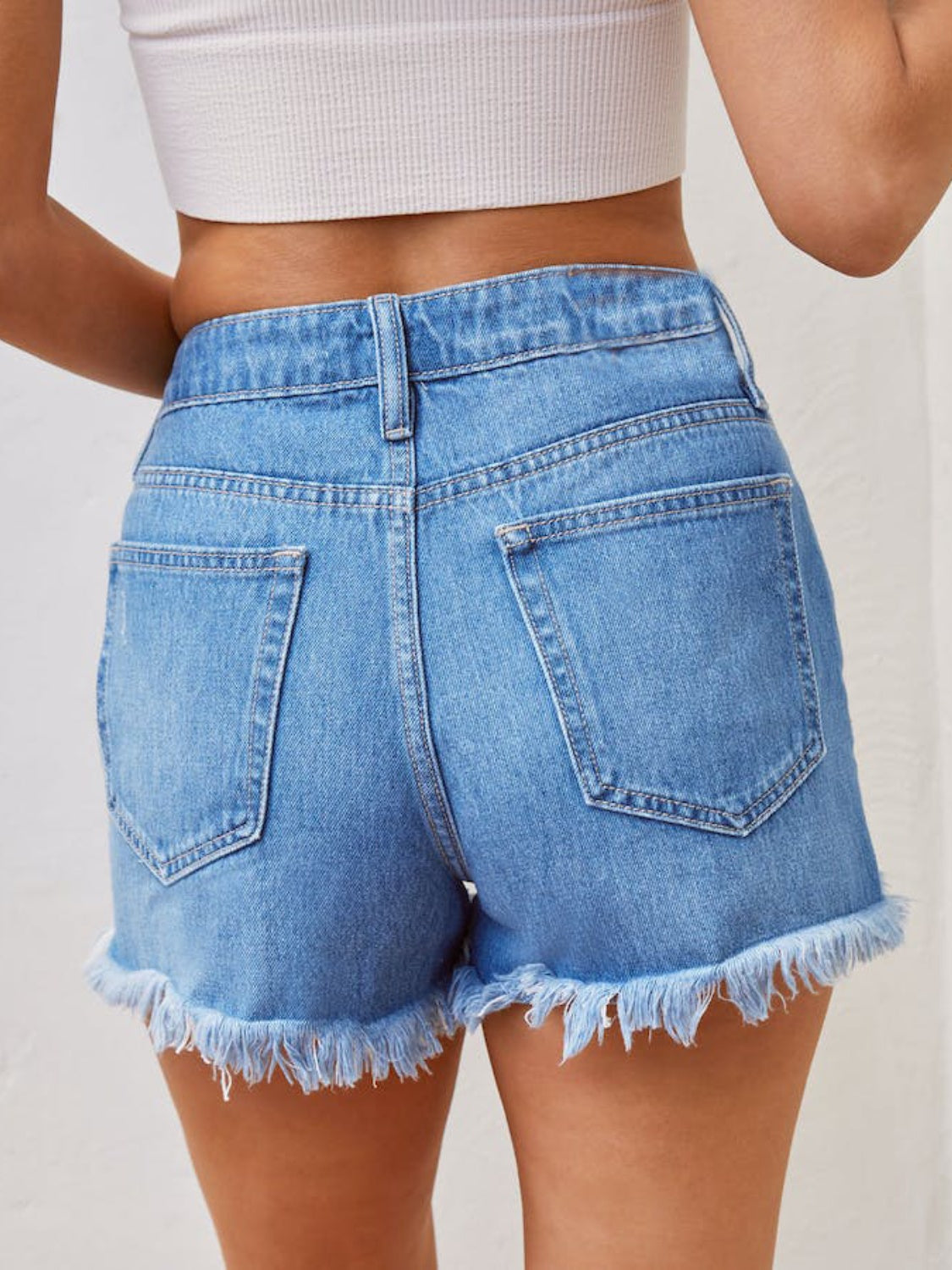 Shorts de mezclilla con dobladillo sin rematar desgastados