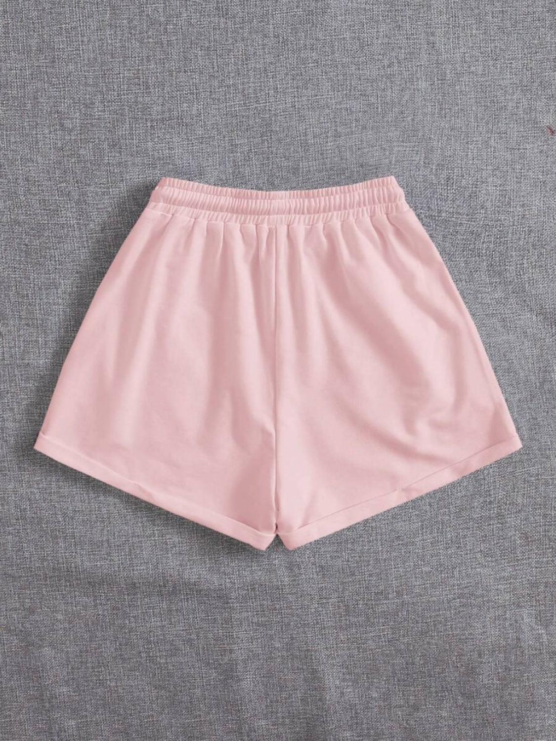 Pantalones cortos con cintura elástica y bolsillos con cordón