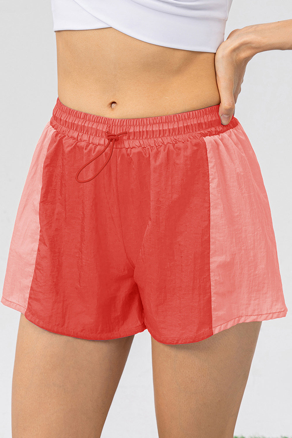 Pantalones cortos deportivos con cordón y bloques de color