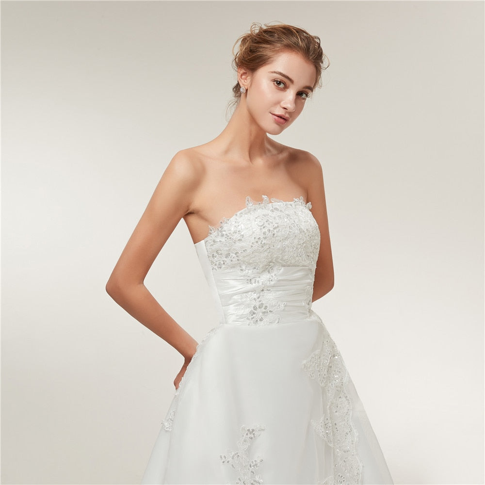 Vestido de novia vintage de encaje con cola larga