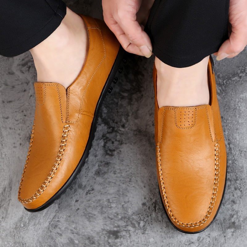 Mocasín de cuero genuino para hombre, zapatos planos negros para hombre, mocasines italianos informales transpirables, cómodos de talla grande