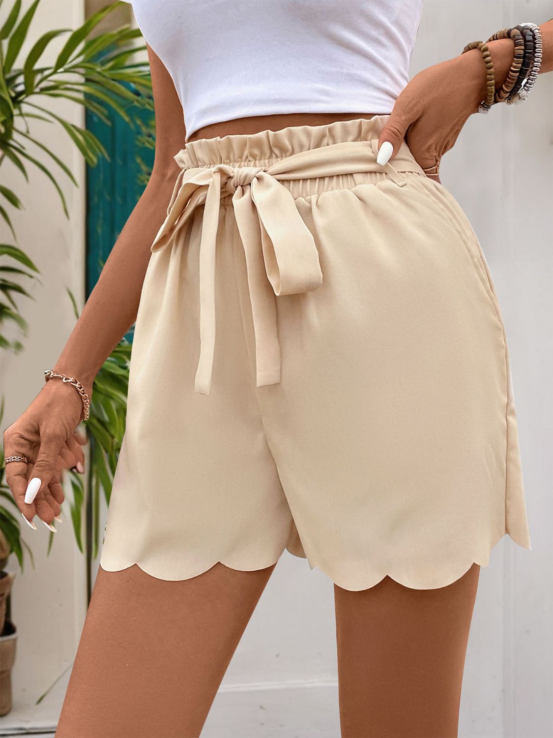 Pantalones cortos con volantes y bolsillos