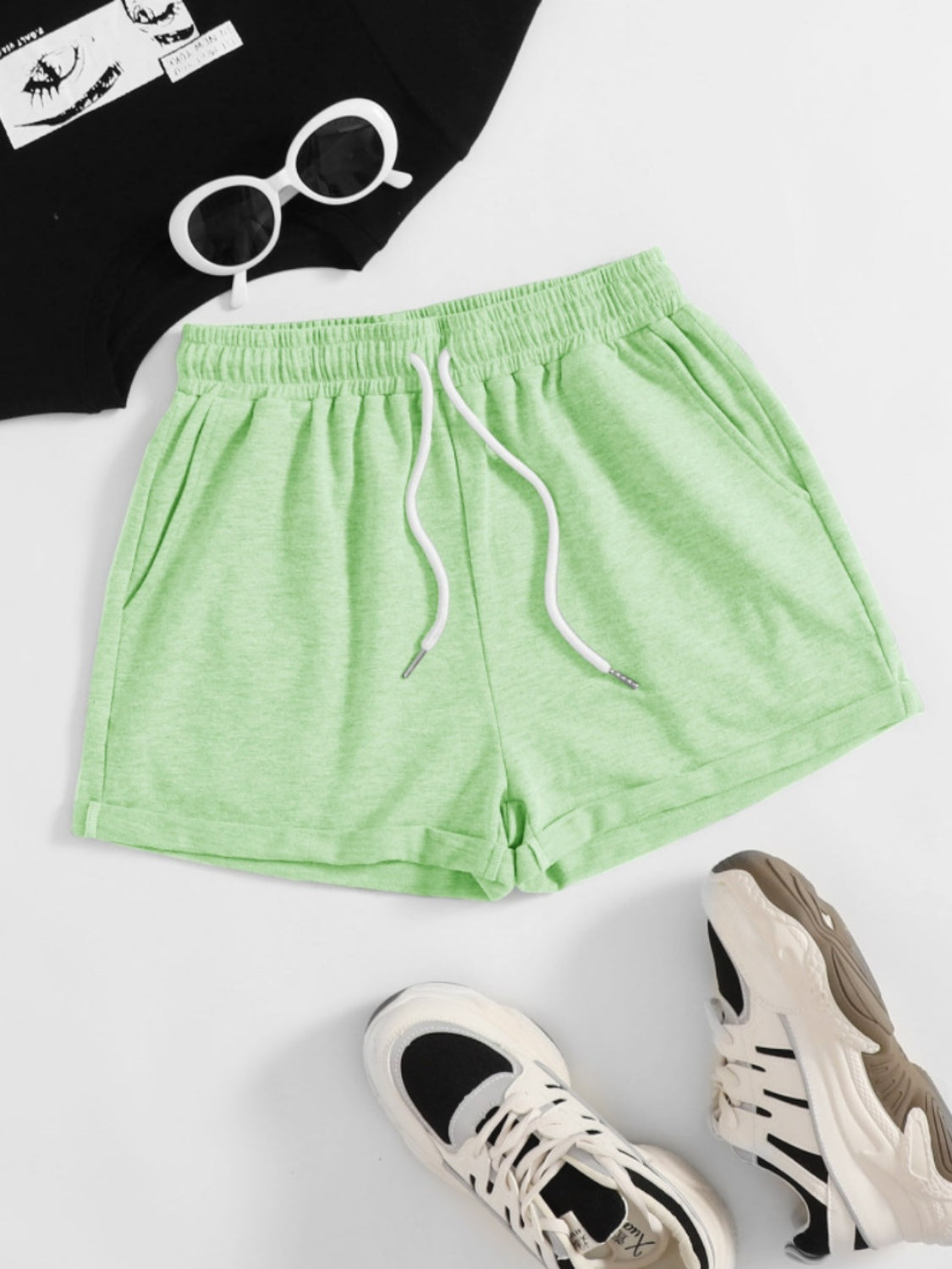 Pantalones cortos con cintura elástica y bolsillos con cordón