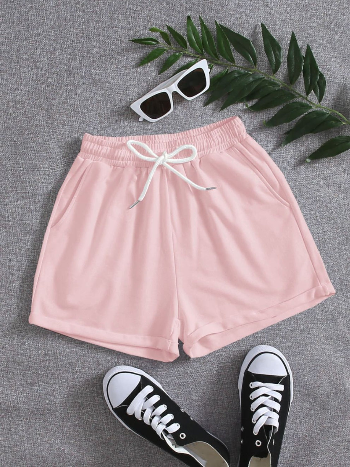 Pantalones cortos con cintura elástica y bolsillos con cordón