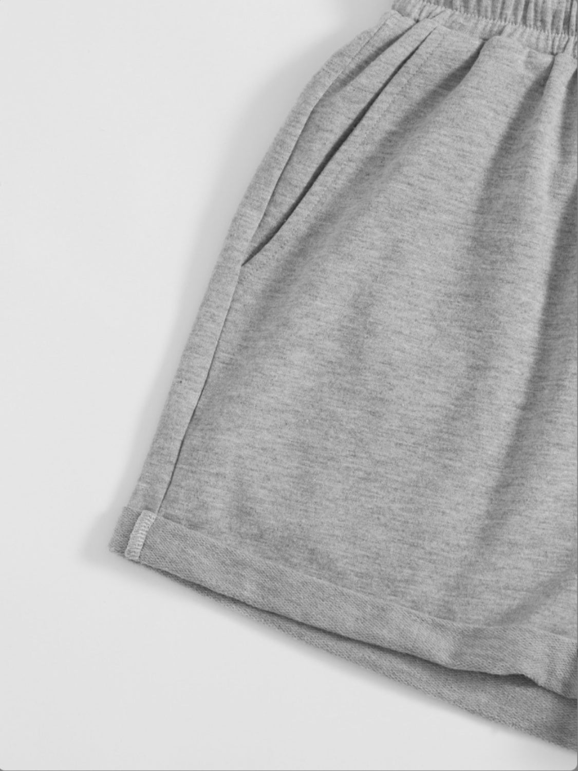Pantalones cortos con cintura elástica y bolsillos con cordón
