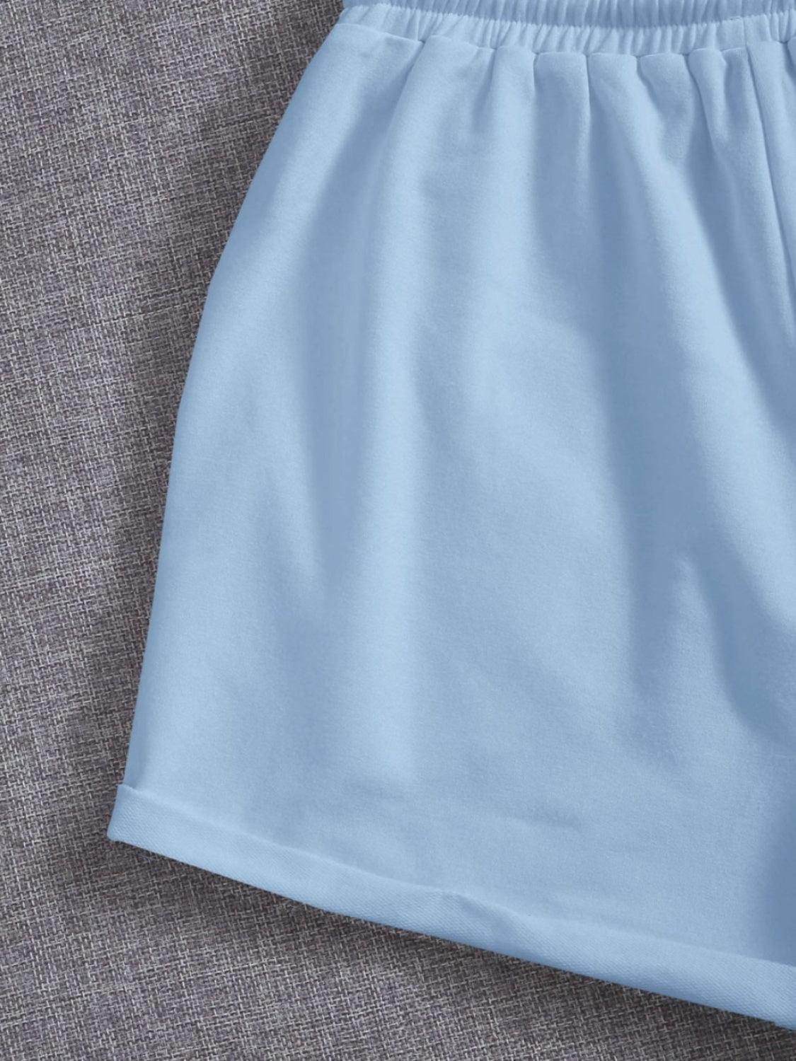 Pantalones cortos con cintura elástica y bolsillos con cordón