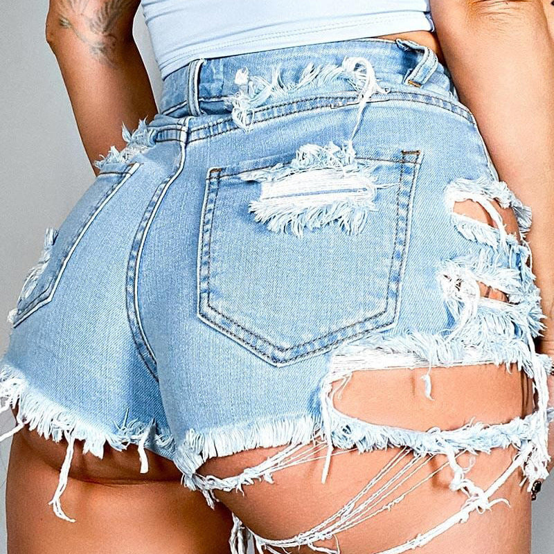 Pantalones cortos de mezclilla desgastados asimétricos