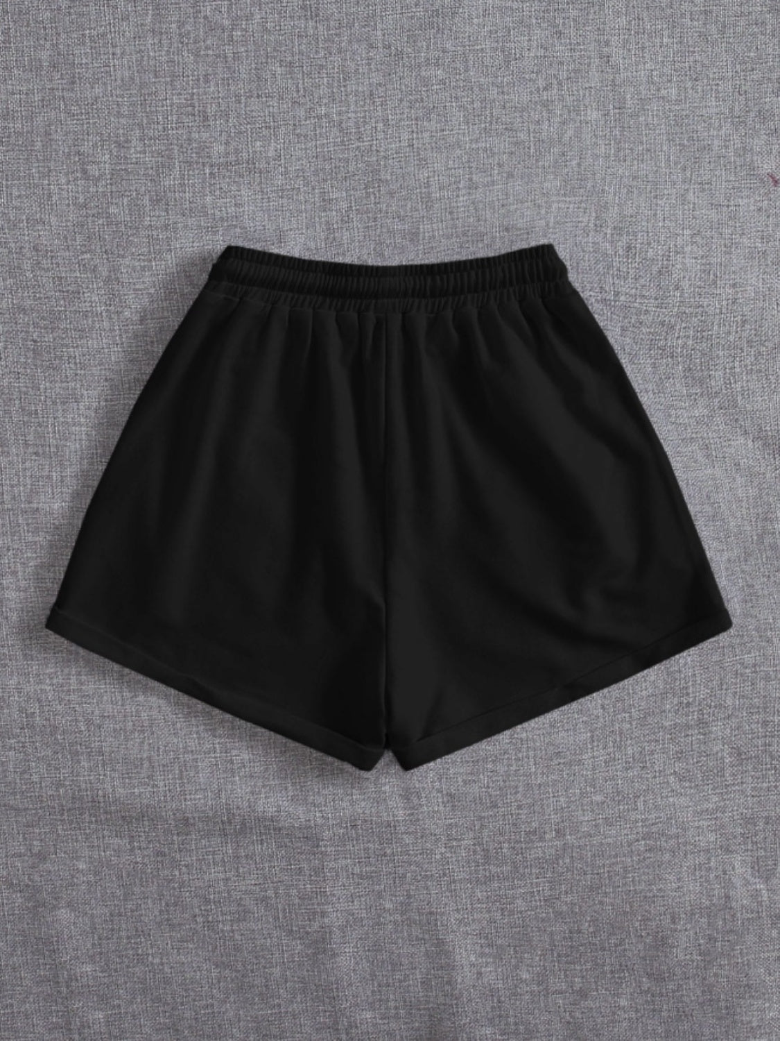 Pantalones cortos con cintura elástica y bolsillos con cordón