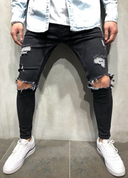 Jeans ajustados rasgados de cintura media de moda para hombres