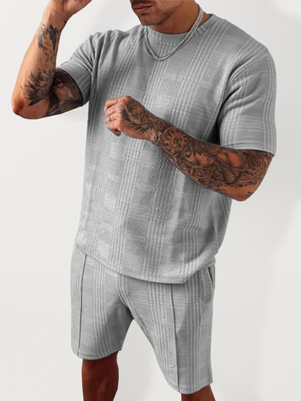 Conjunto de camiseta y pantalones cortos con estampado de cuadros para hombre