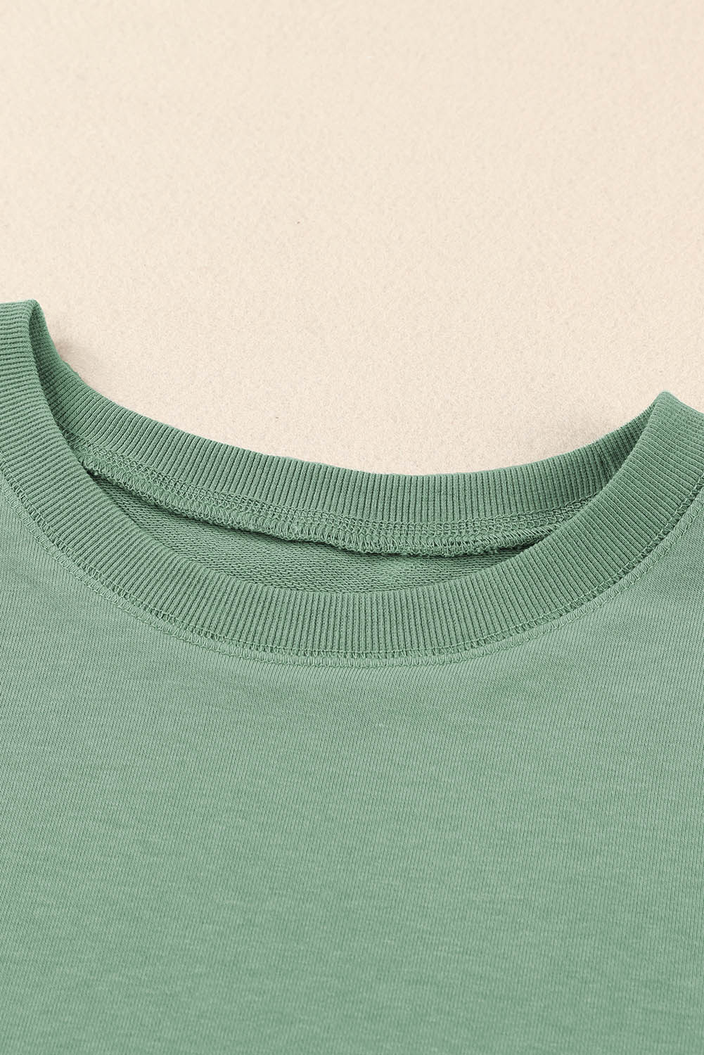 Sudadera con hombros caídos y abertura lateral