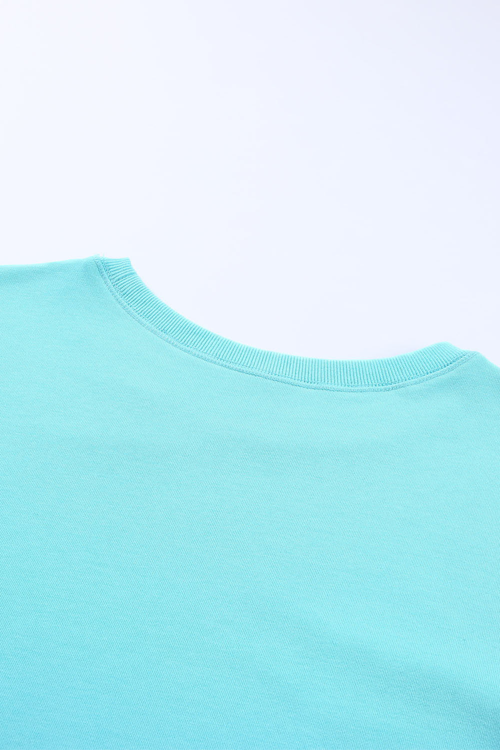 Sudadera con hombros caídos y abertura lateral