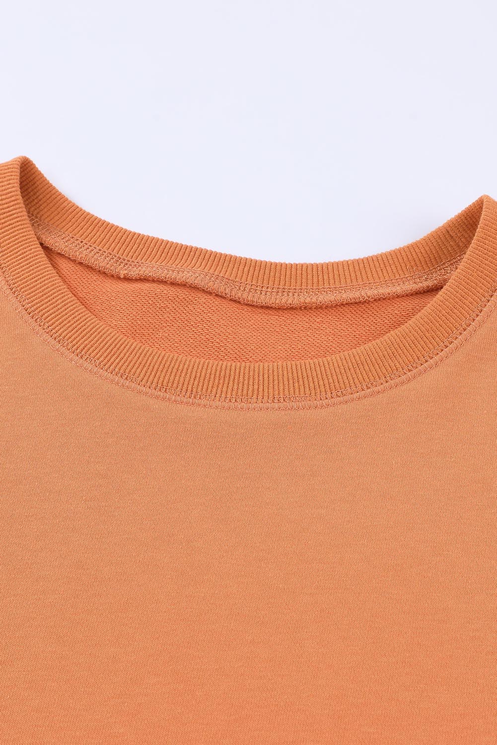 Sudadera con hombros caídos y abertura lateral