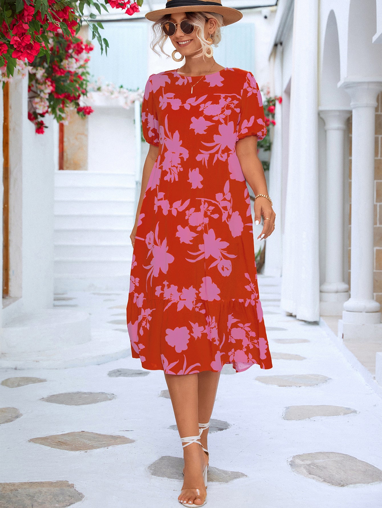 Vestido a media pierna con volantes y mangas abullonadas florales