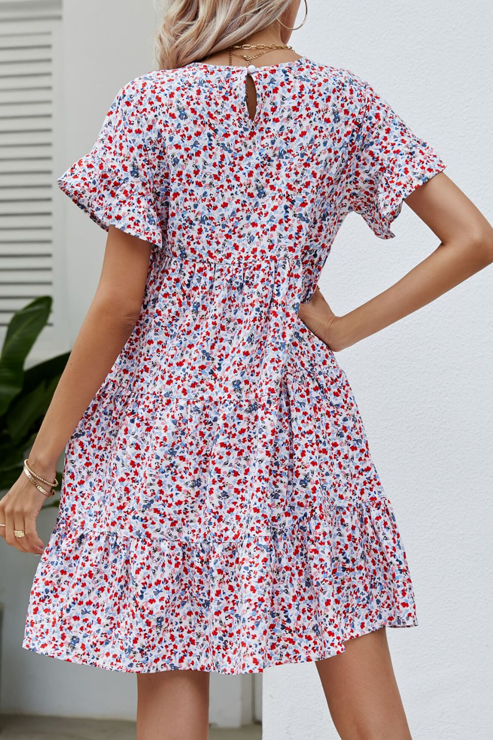 Vestido a capas con volantes y manga floral de florecitas