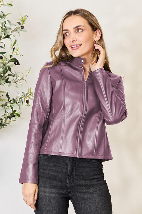 Chaqueta con cuello alto y cremallera