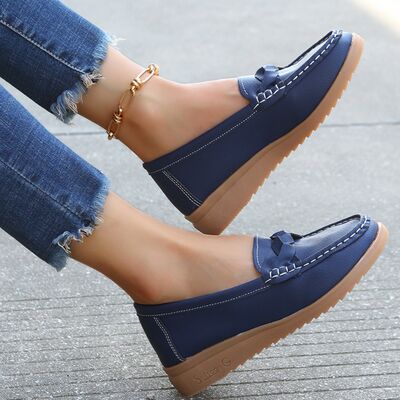 Mocasines con tacón de cuña y tejido