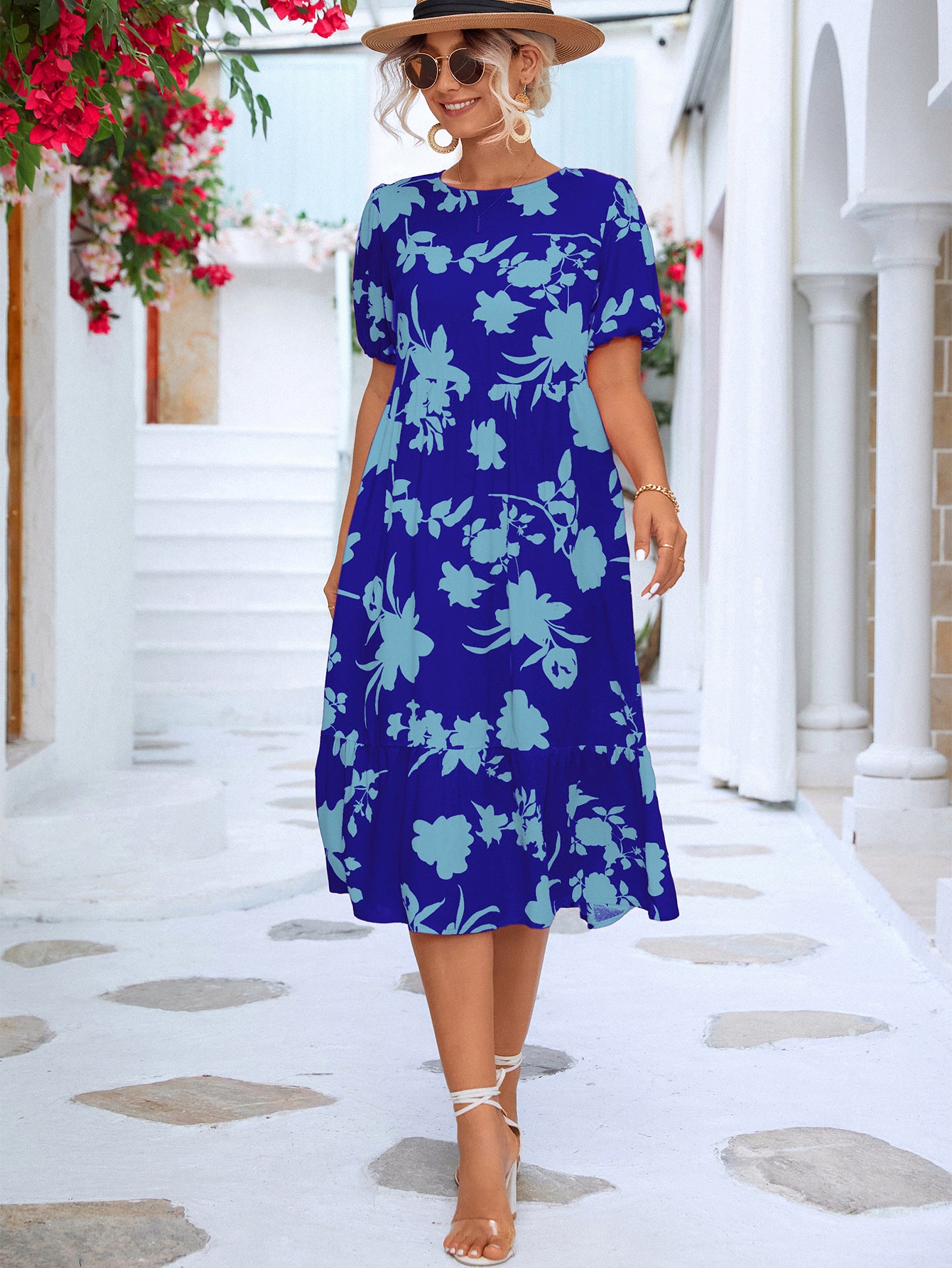 Vestido a media pierna con volantes y mangas abullonadas florales