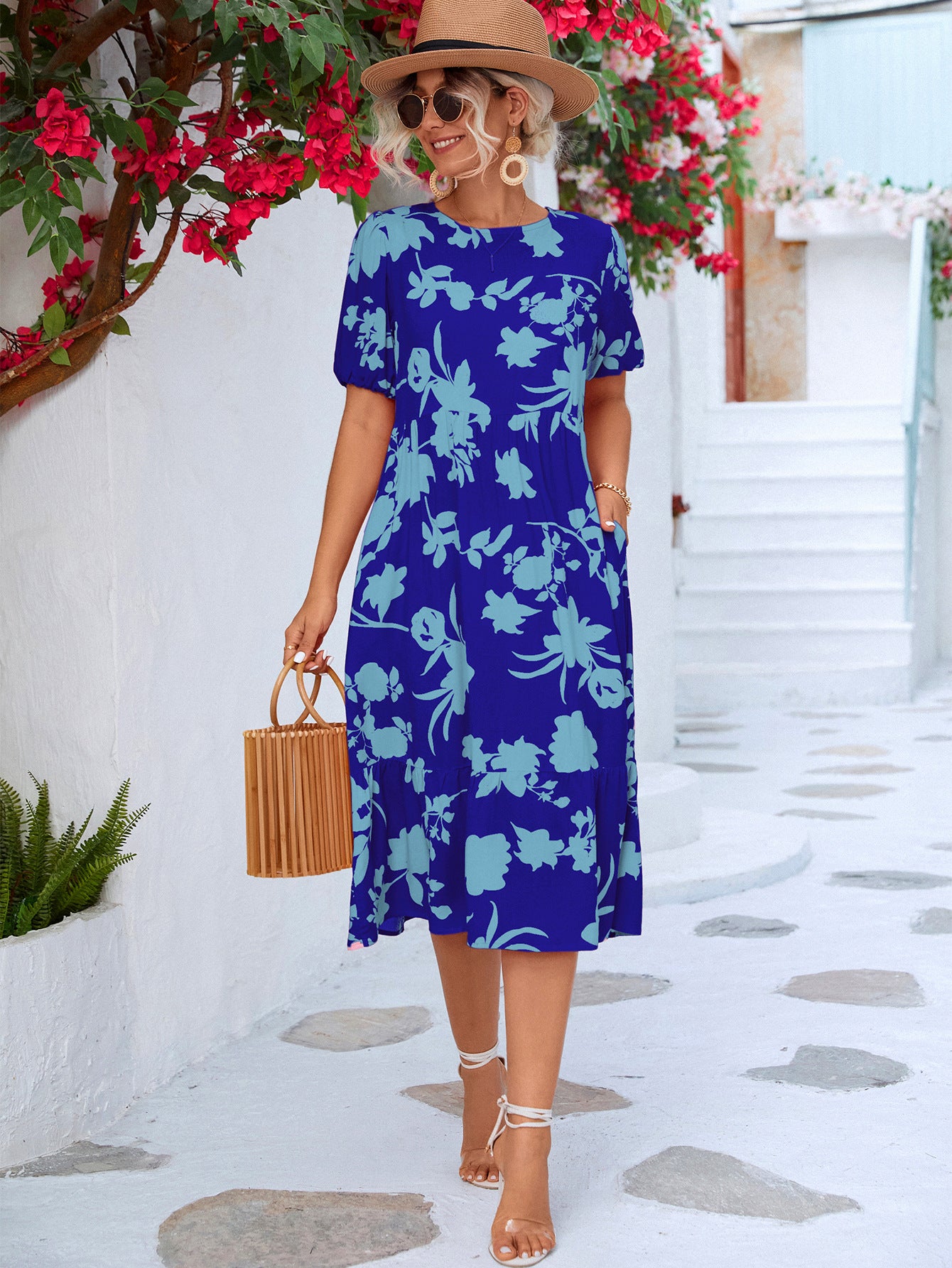 Vestido a media pierna con volantes y mangas abullonadas florales