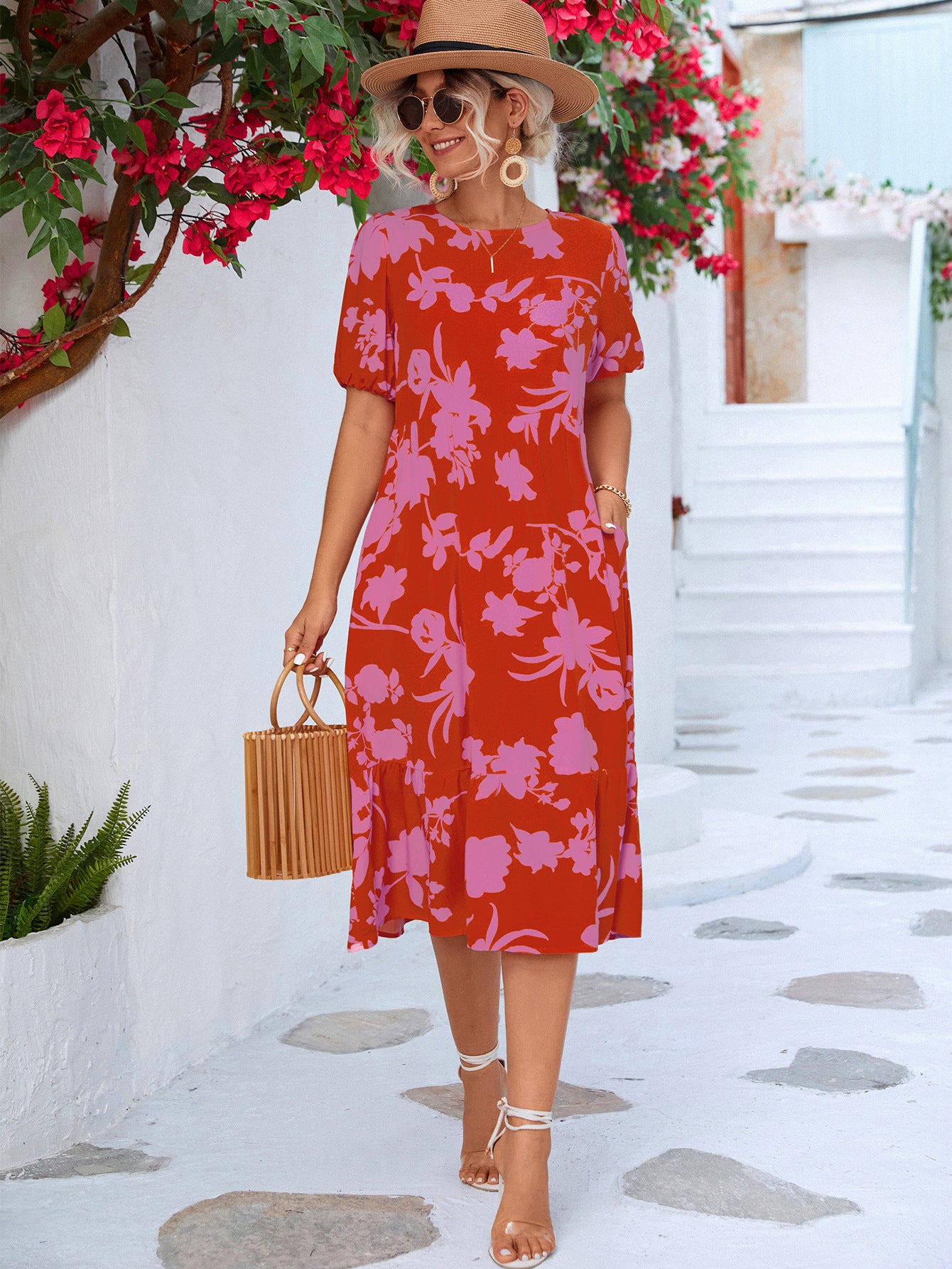 Vestido a media pierna con volantes y mangas abullonadas florales
