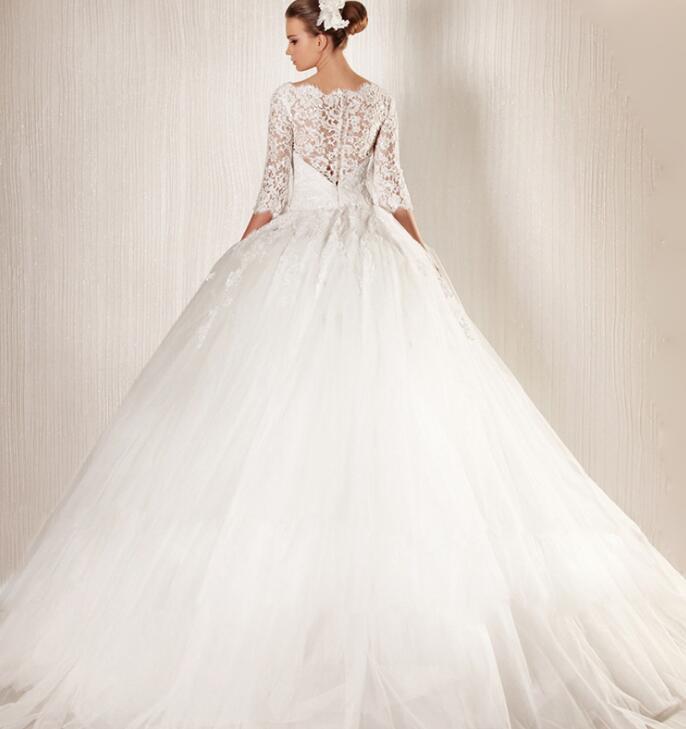 Vestido de novia estilo princesa con mangas largas y encaje francés de ángel