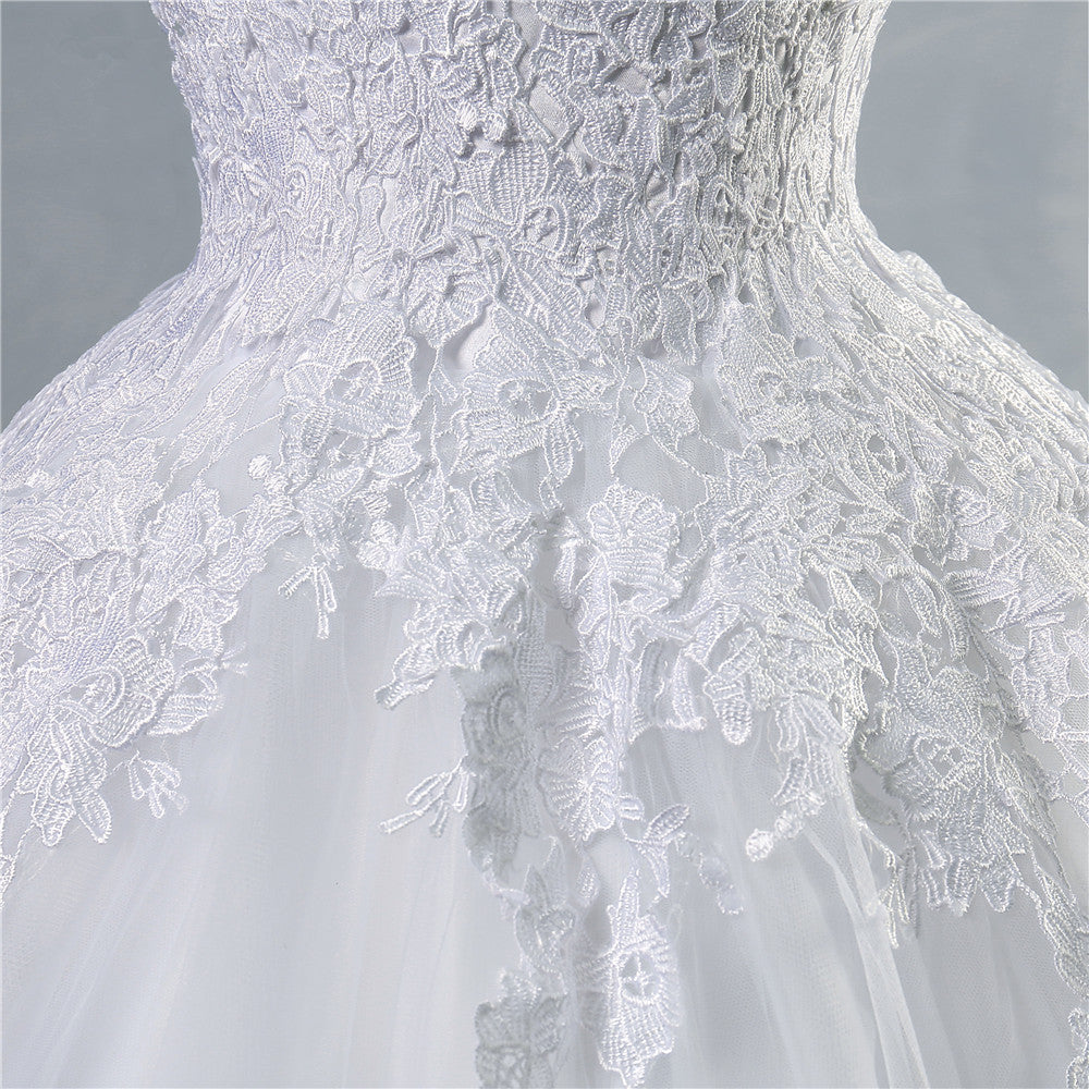 Vestido de novia de corte A con encaje blanco y color marfil 