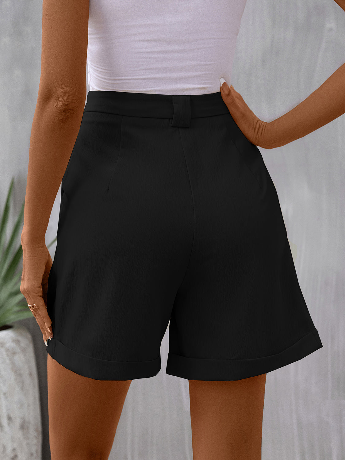 Pantalones cortos de cintura media con bolsillos