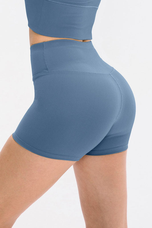 Pantalones cortos deportivos ajustados con cintura ancha