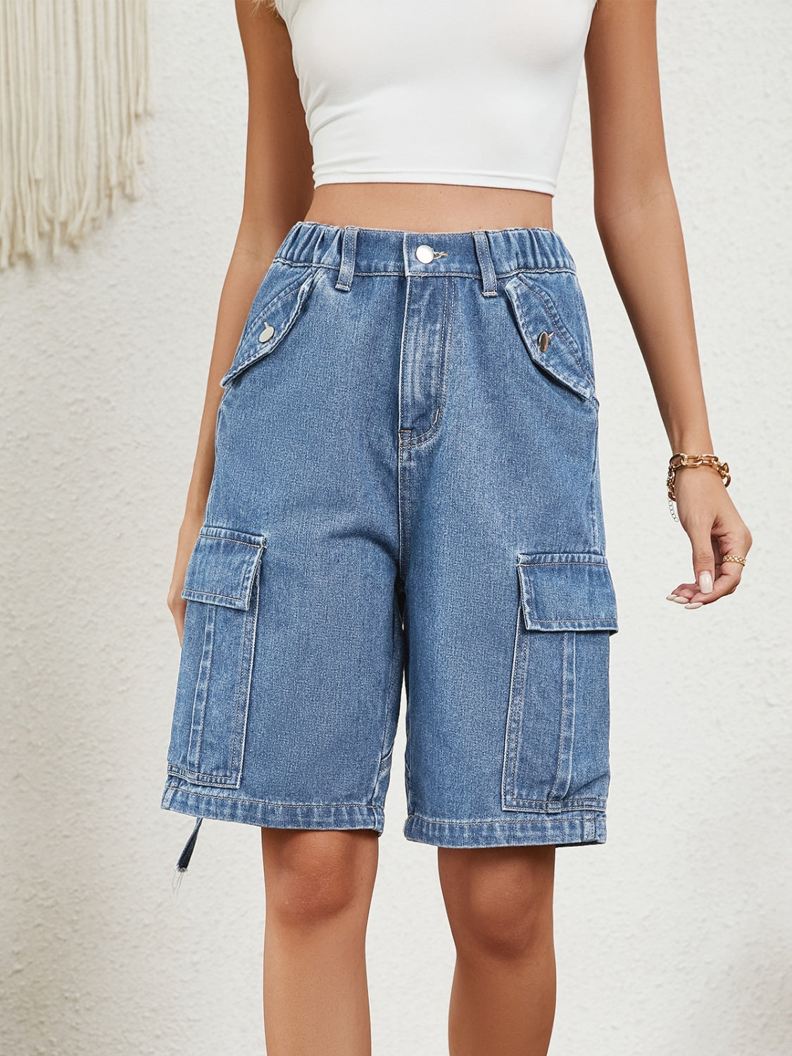 Pantalones cortos de mezclilla de cintura alta con bolsillos