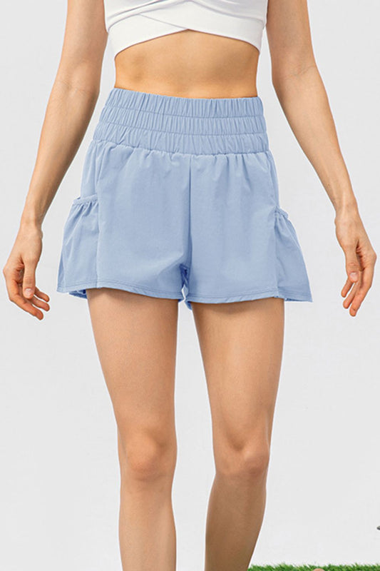 Pantalones cortos deportivos con bolsillos y cintura elástica