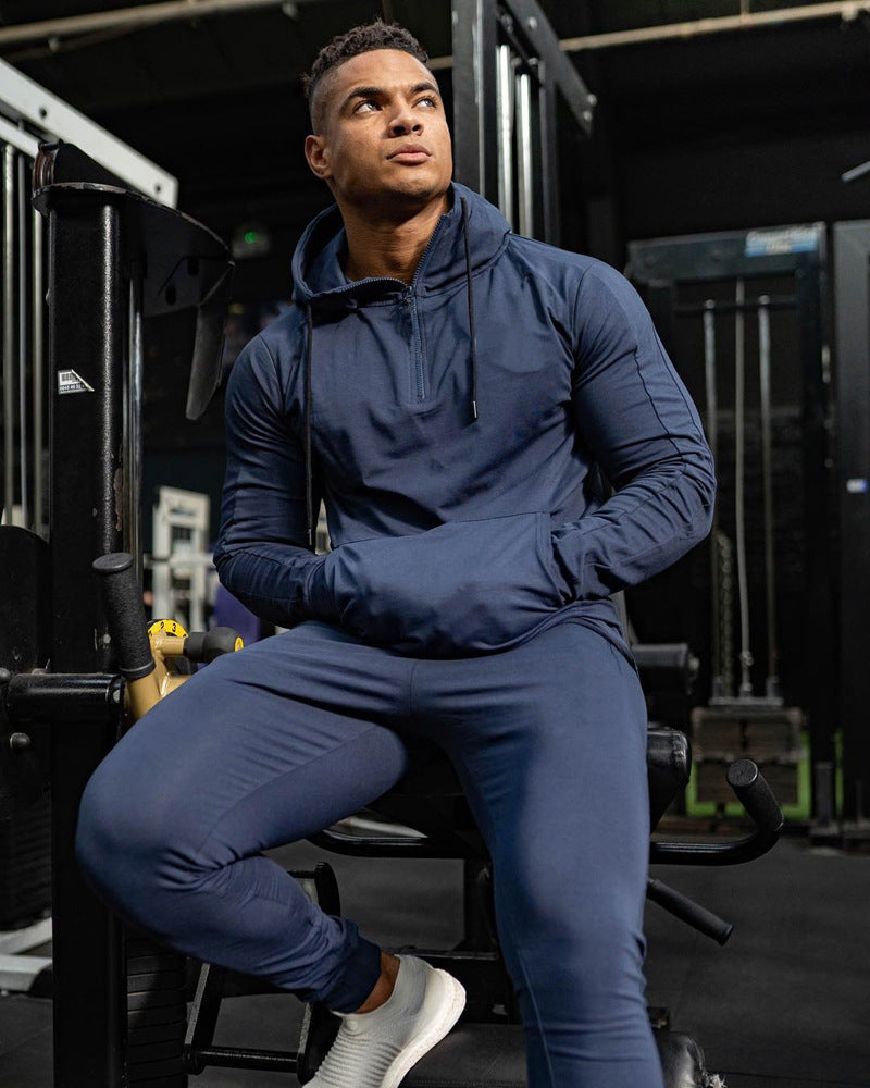 Europa y América Músculo Ocio Deportes Ropa de fitness Traje de hermano para hombre Otoño e invierno Pantalones de chándal con capucha Conjunto de algodón de dos piezas 