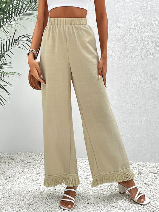 Pantalones anchos con detalle de flecos