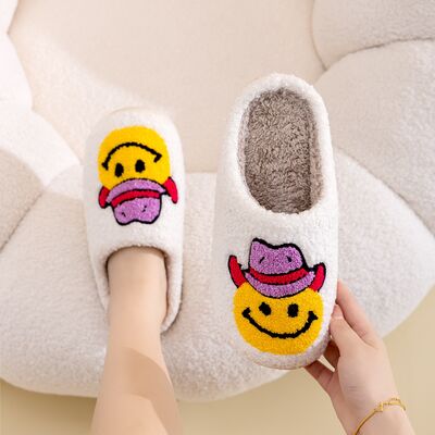 Pantuflas con cara sonriente de Melody