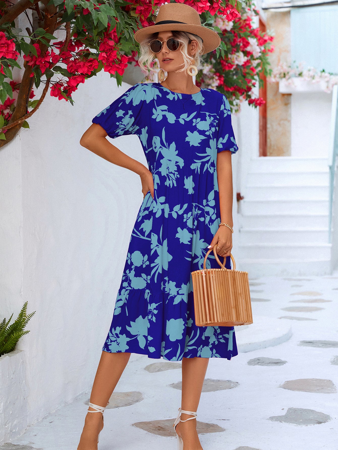 Vestido a media pierna con volantes y mangas abullonadas florales